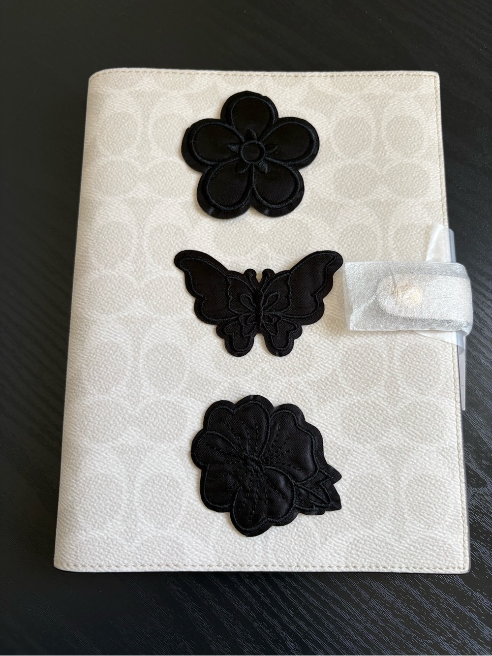 Coach White Signature Notebook with Black Floral & Butterfly Appliqués